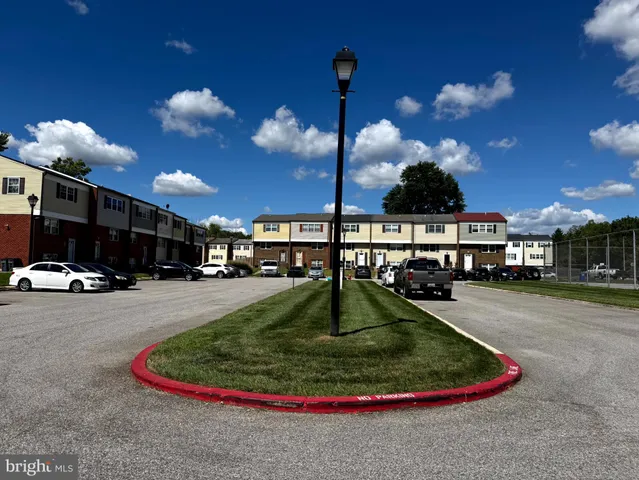 a swimming pool with outdoor seating