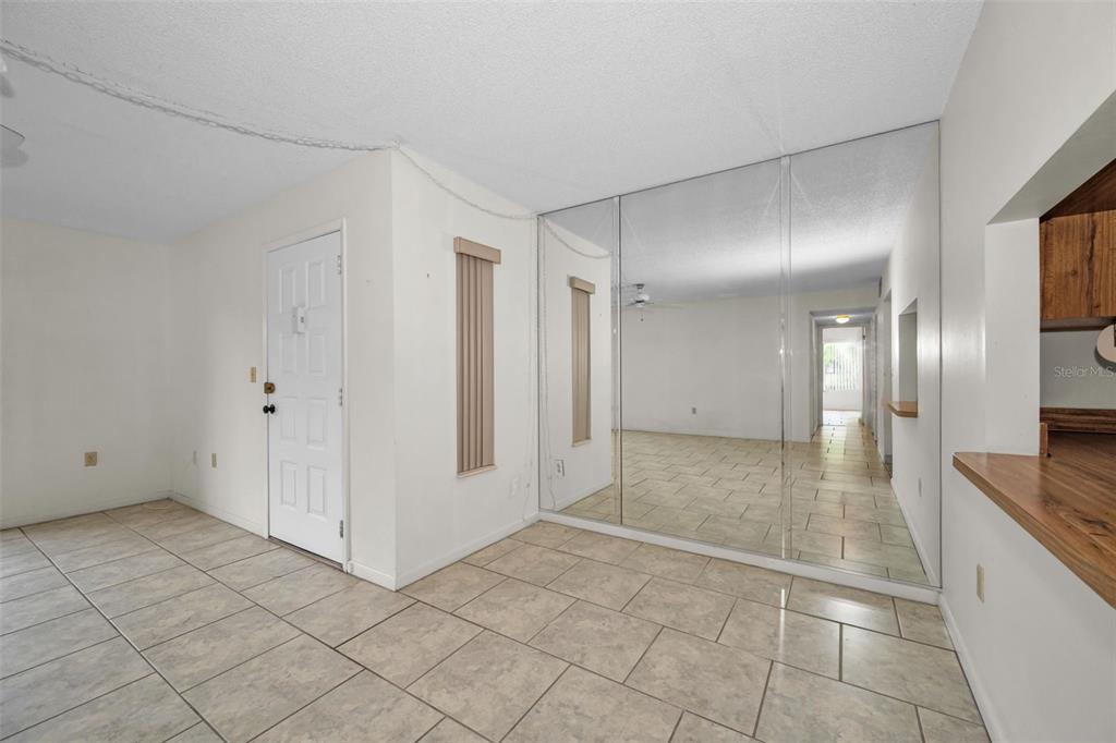 2687 Pine Ridge Way South, Unit B2 Palm Harbor, FL 34684 - Photo 18 of 68 a view of a hallway