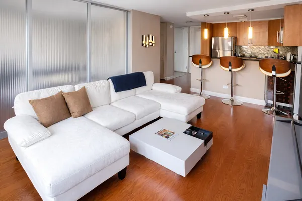 a living room with furniture and a table