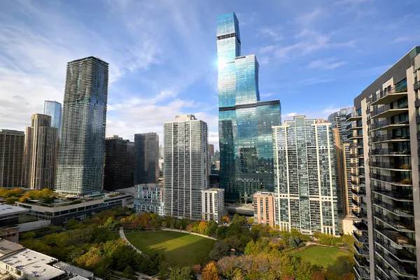a view of city with tall buildings