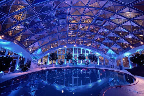 a view of swimming pool with seating area