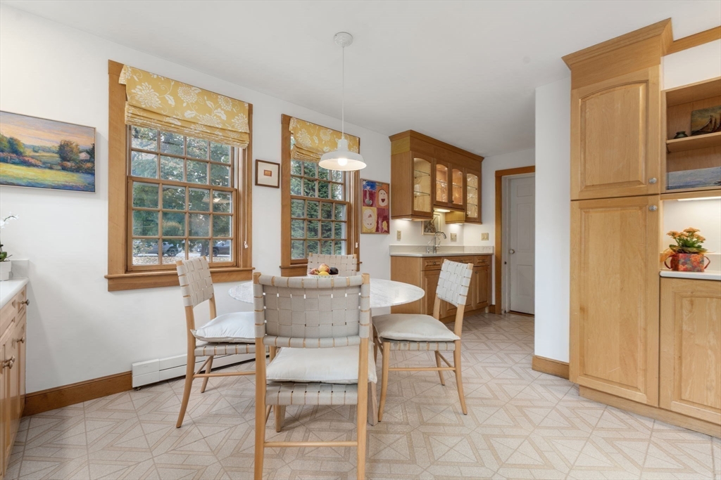 221 Boston Post Road Wayland, MA 01778 - Photo 11 of 37 a dining room with furniture and a window