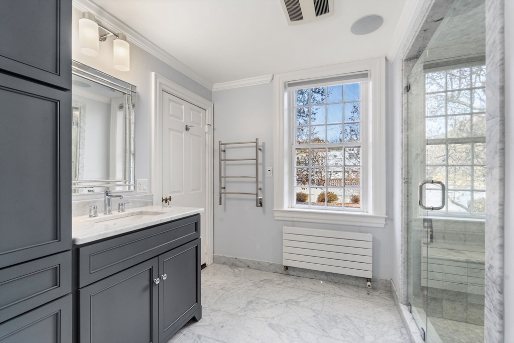 221 Boston Post Road Wayland, MA 01778 - Photo 14 of 37 a bathroom with a sink double vanity and a mirror