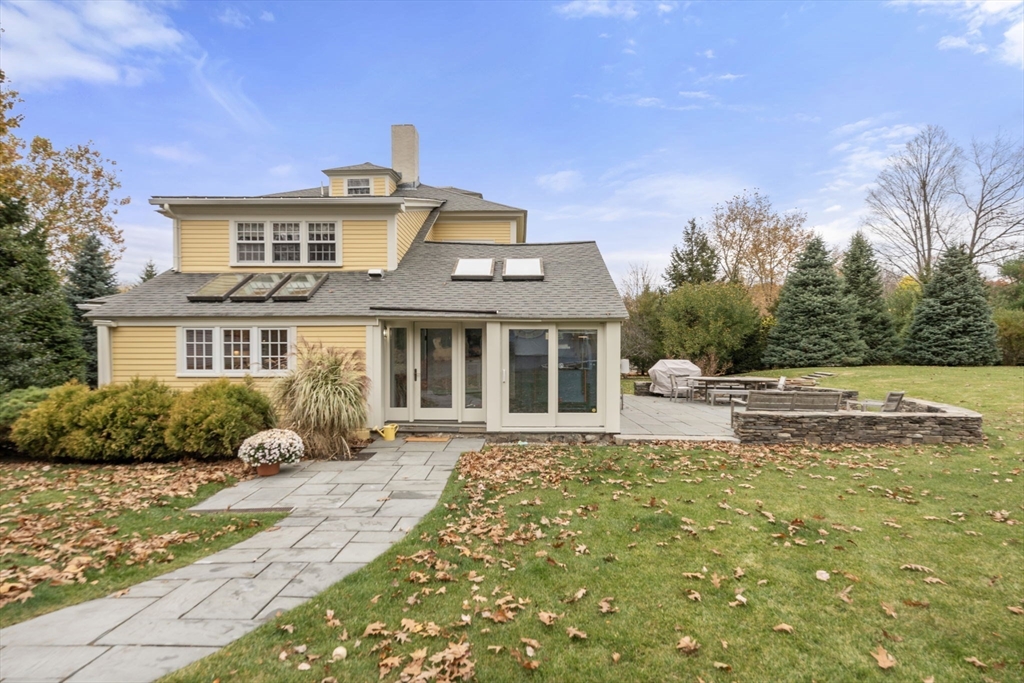 221 Boston Post Road Wayland, MA 01778 - Photo 29 of 37 a front view of a house with a yard