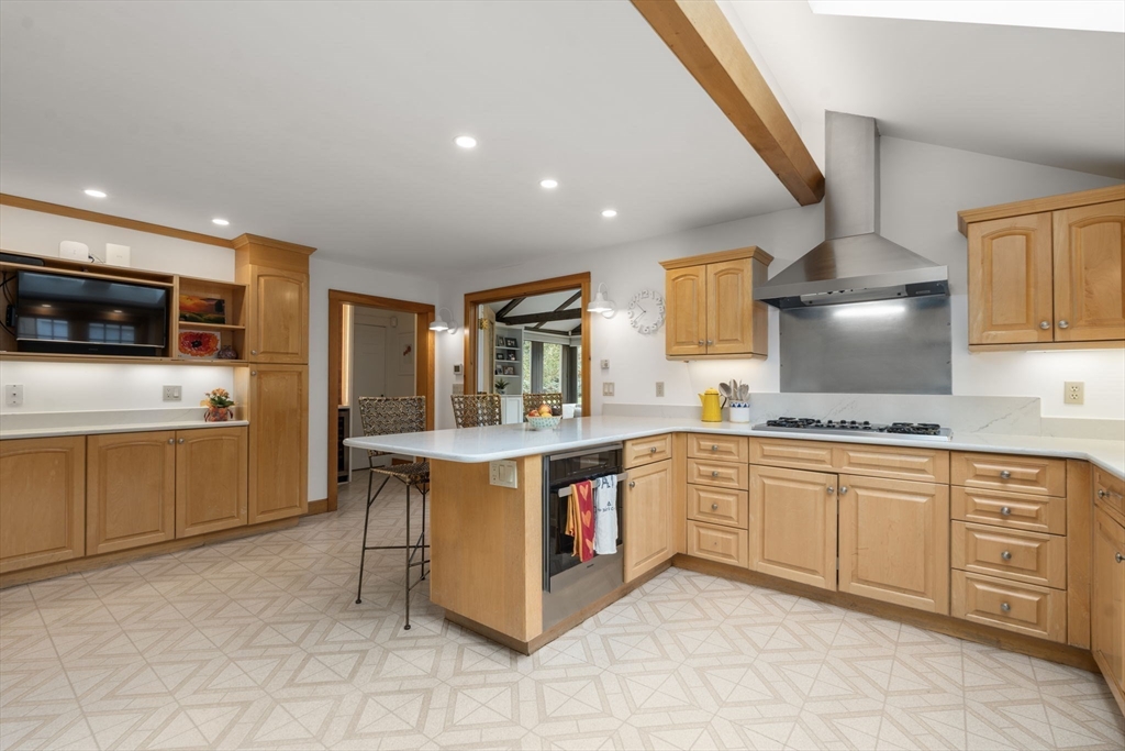221 Boston Post Road Wayland, MA 01778 - Photo 7 of 37 a large kitchen with stainless steel appliances granite countertop a stove and a sink