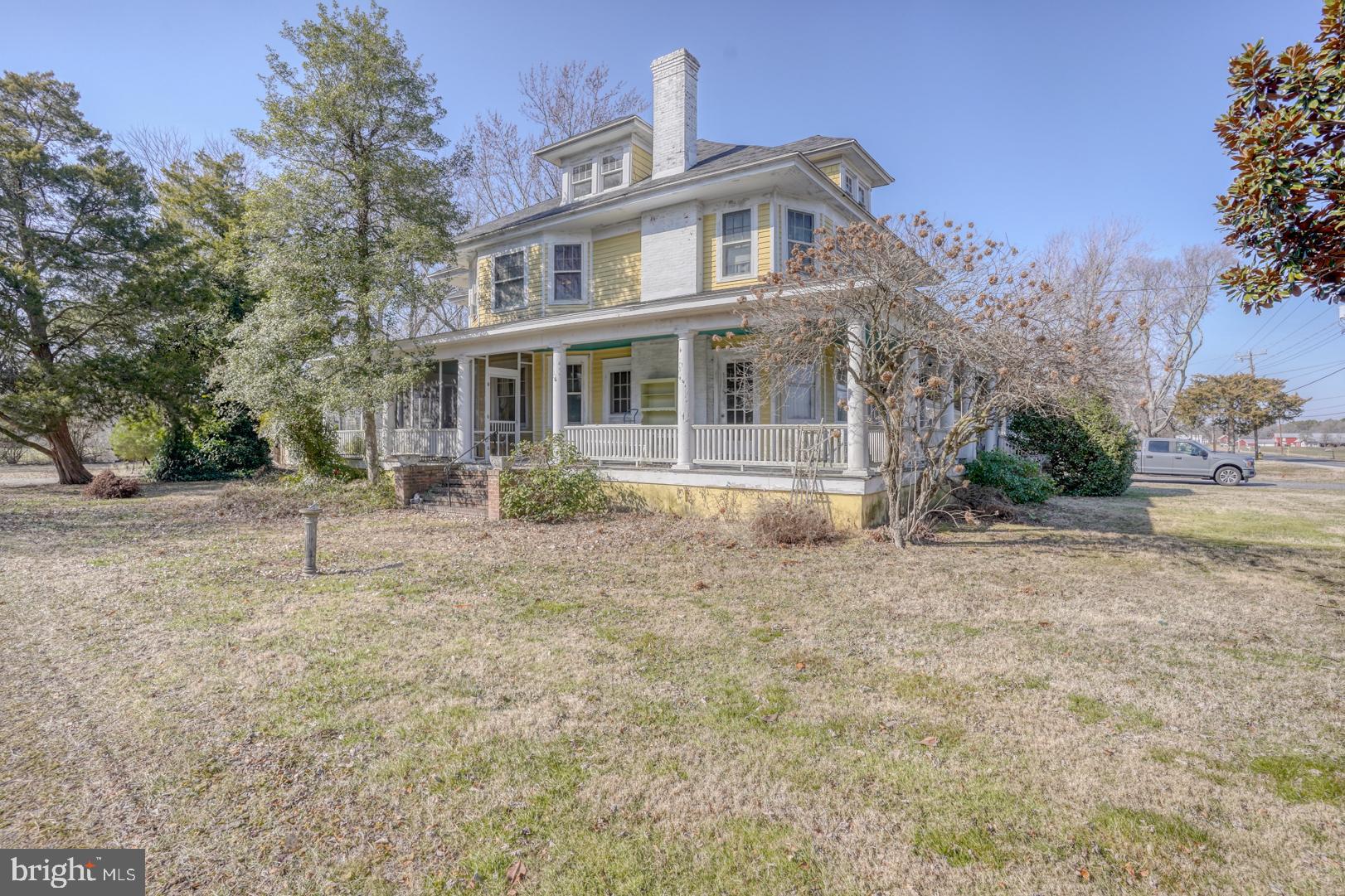 4096 Main Street Trappe, MD 21673 - Photo 5 of 70 a front view of a house with garden