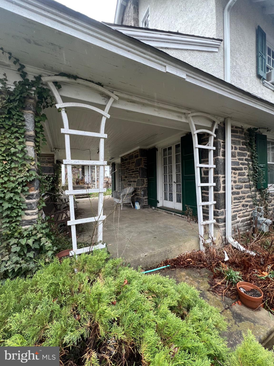 111 Penarth Road Bala Cynwyd, PA 19004 - Photo 2 of 20 Charming entryway with lush greenery.