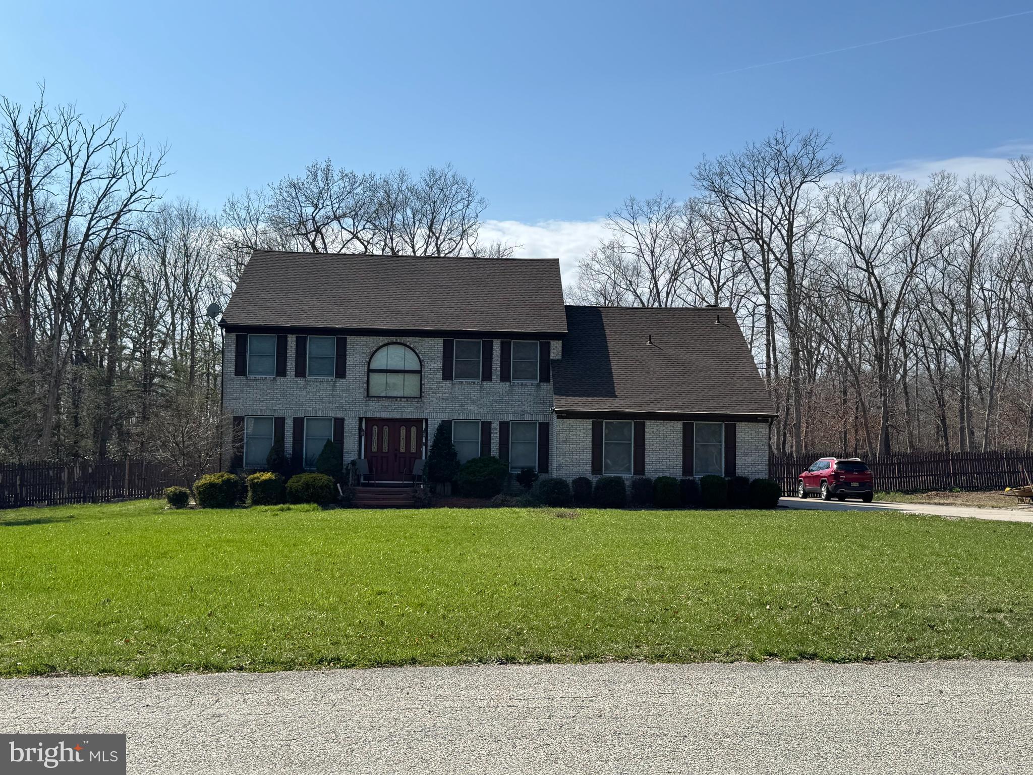 4770 Stoney Bridge Road Millville, NJ 08332 - Photo 1 of 1 front view of a house with a yard
