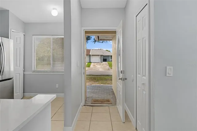 a bathroom with a tub shower and a sink