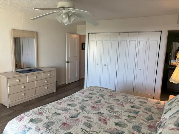 a bathroom with a sink a toilet and shower curtain