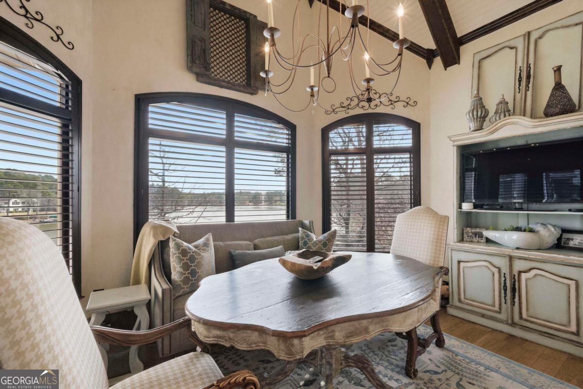 1691 Lighthouse Circle Greensboro, GA 30642 - Photo 22 of 75 a view of a dining room with furniture window and outside view