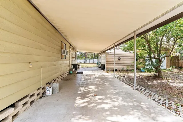 a view of a street with many windows