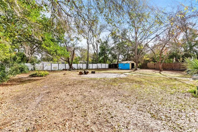 a house with trees in front of it