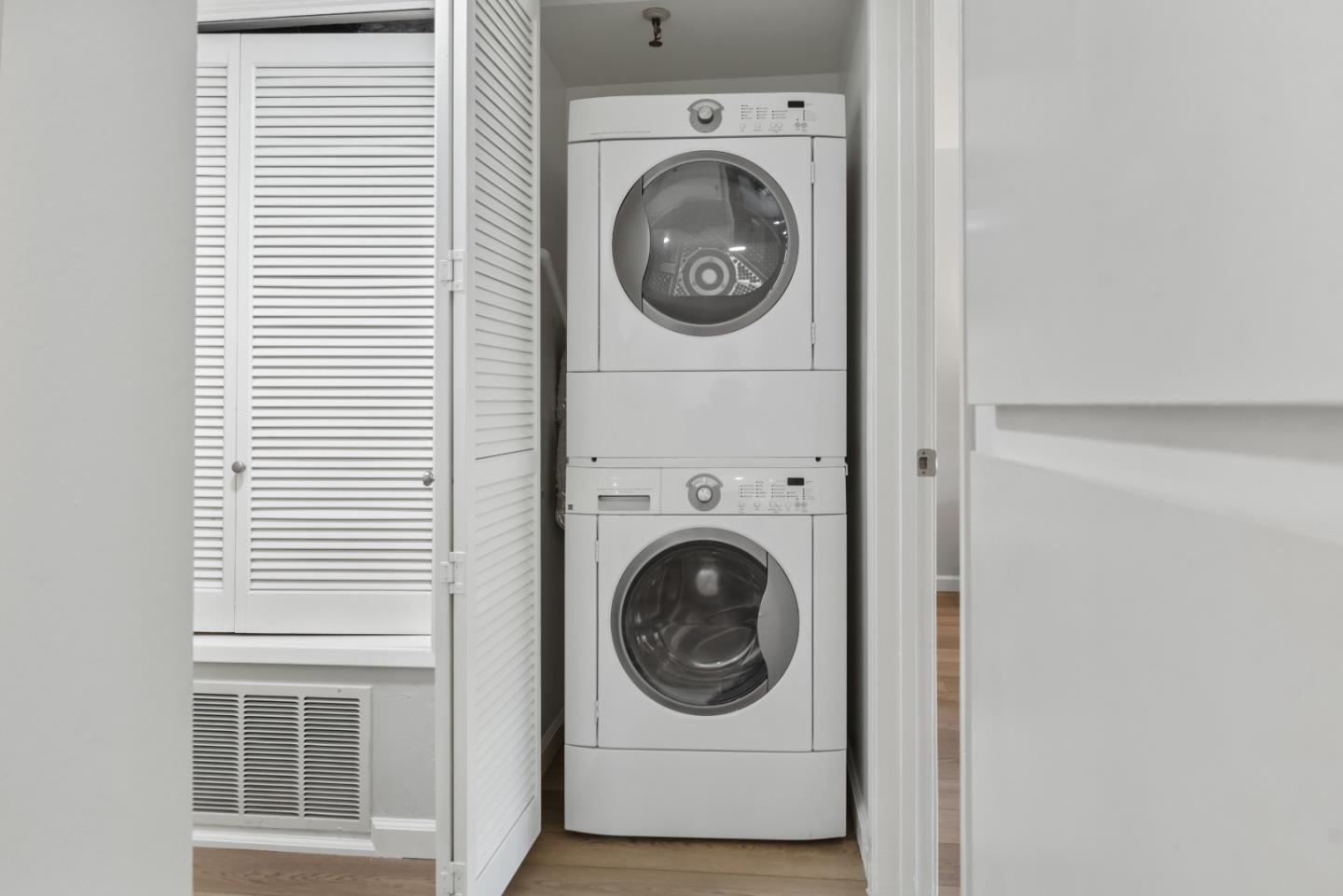 49 Showers Drive, Unit E250 Mountain View, CA 94040 - Photo 11 of 27 a utility room with dryer and washer