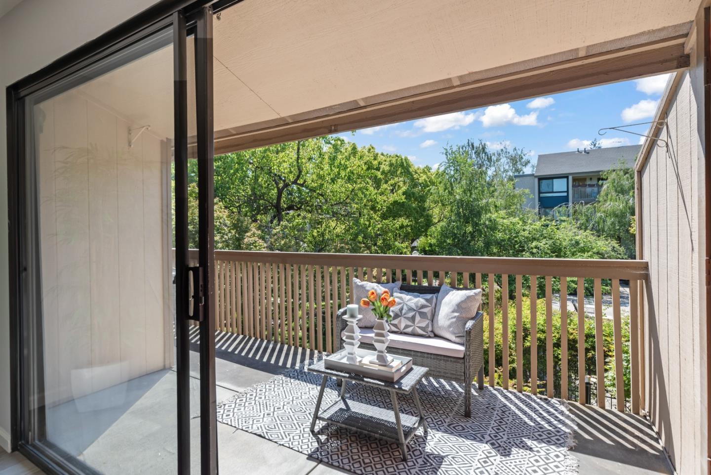 49 Showers Drive, Unit E250 Mountain View, CA 94040 - Photo 17 of 27 a balcony with chairs