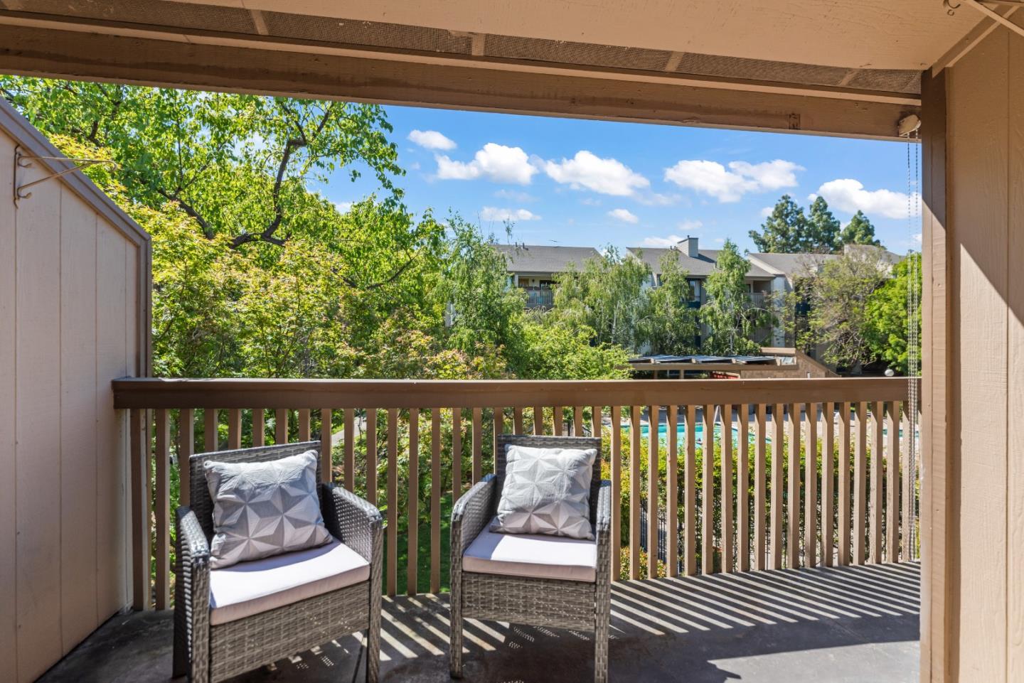 49 Showers Drive, Unit E250 Mountain View, CA 94040 - Photo 18 of 27 a view of a two chair in the balcony