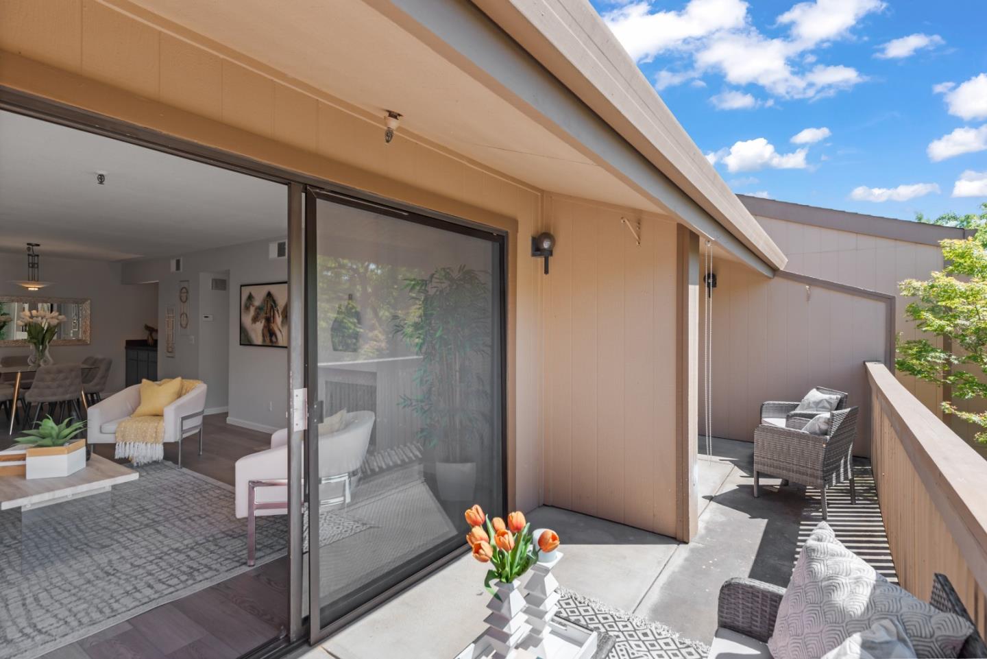 49 Showers Drive, Unit E250 Mountain View, CA 94040 - Photo 19 of 27 a living room with furniture