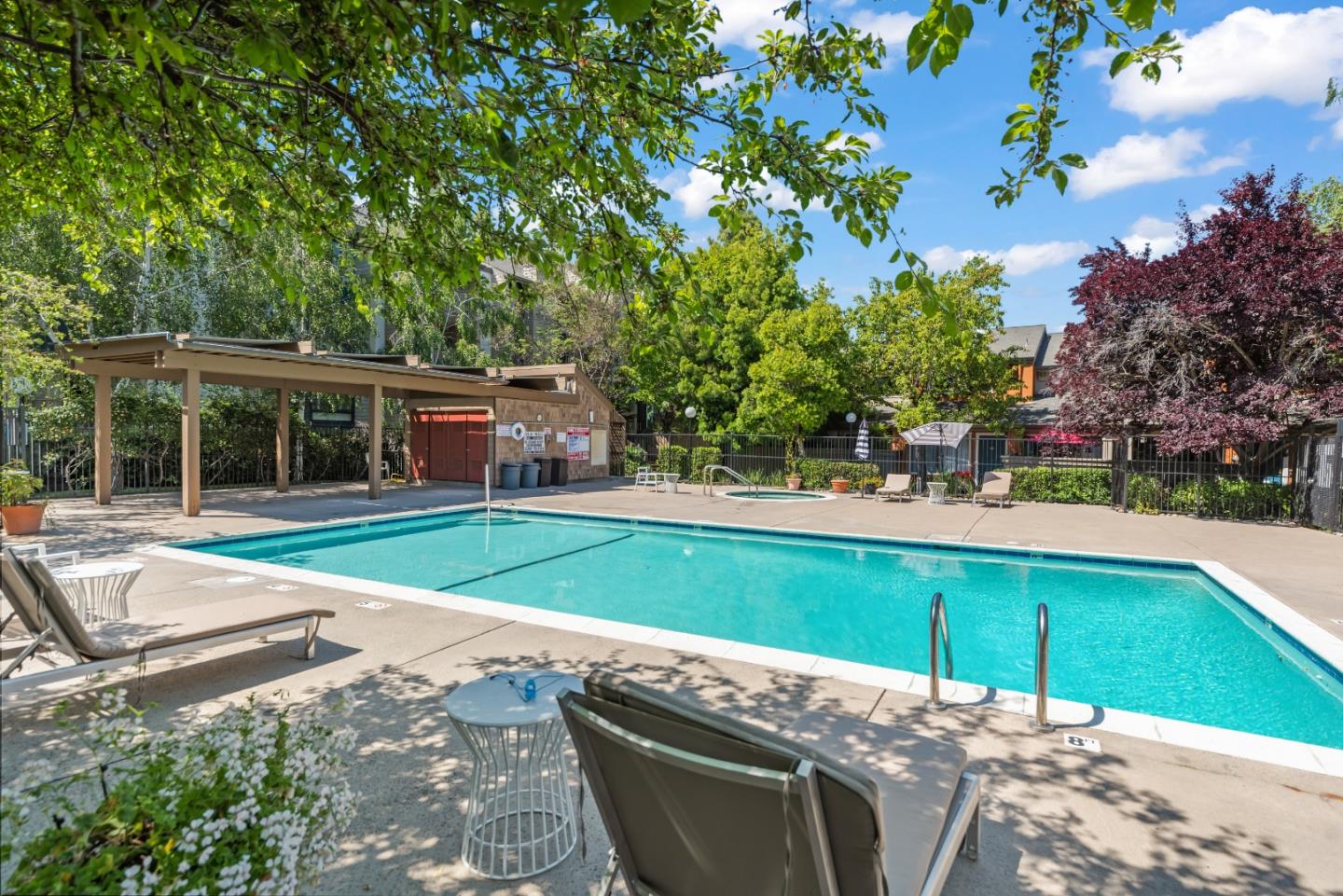 49 Showers Drive, Unit E250 Mountain View, CA 94040 - Photo 24 of 27 a view of a house with backyard and sitting area