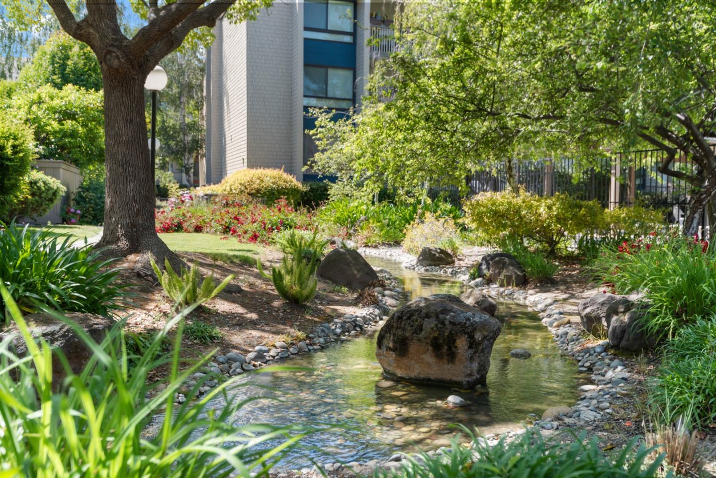49 Showers Drive, Unit E250 Mountain View, CA 94040 - Photo 25 of 27 a vase of flowers sitting on a table