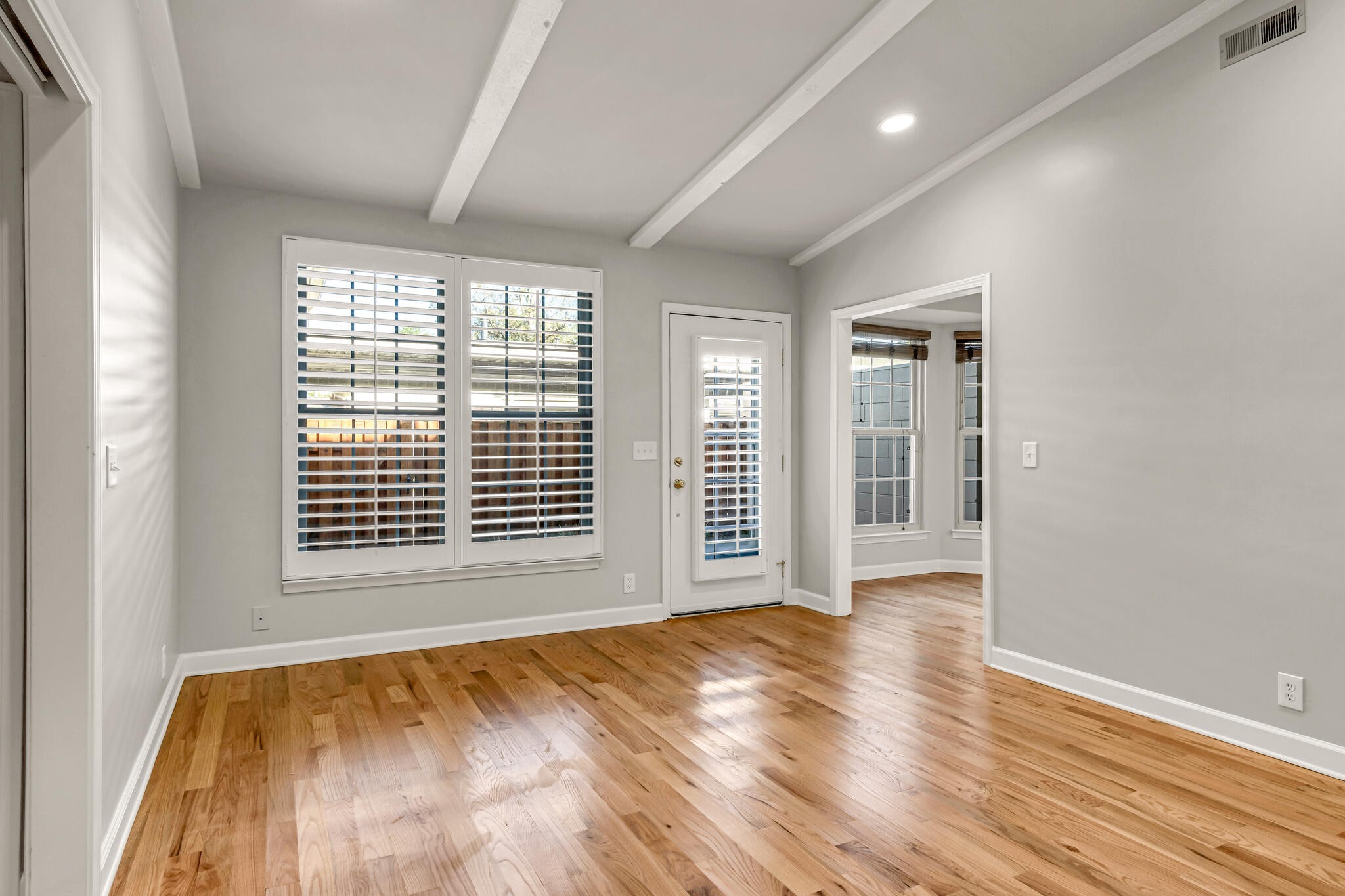 734 General George Patton Road Nashville, TN 37221 - Photo 12 of 29 a view of an empty room with wooden floor and a window
