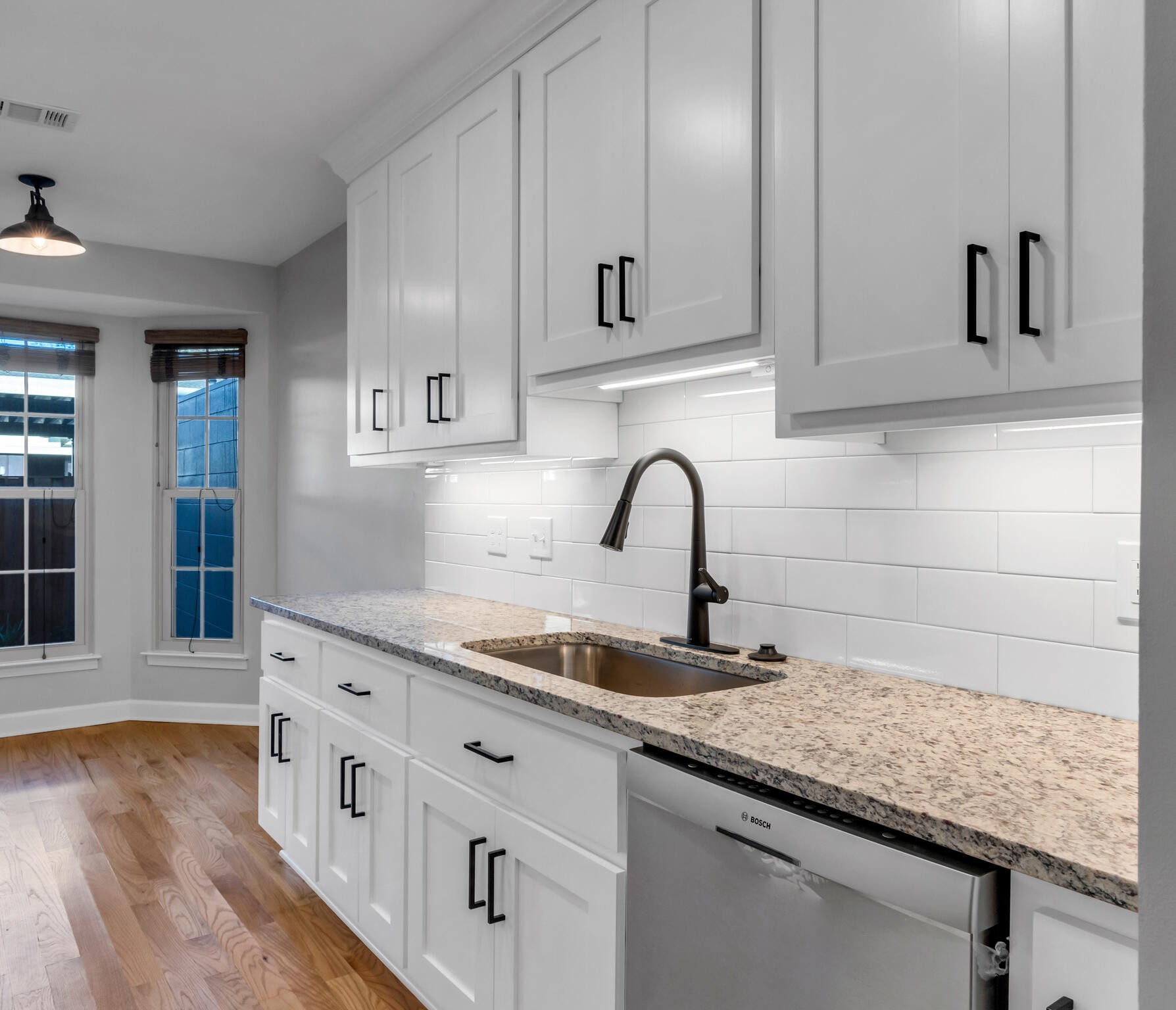 734 General George Patton Road Nashville, TN 37221 - Photo 3 of 29 a kitchen with granite countertop a sink and cabinets
