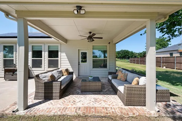 a view of a porch with furniture