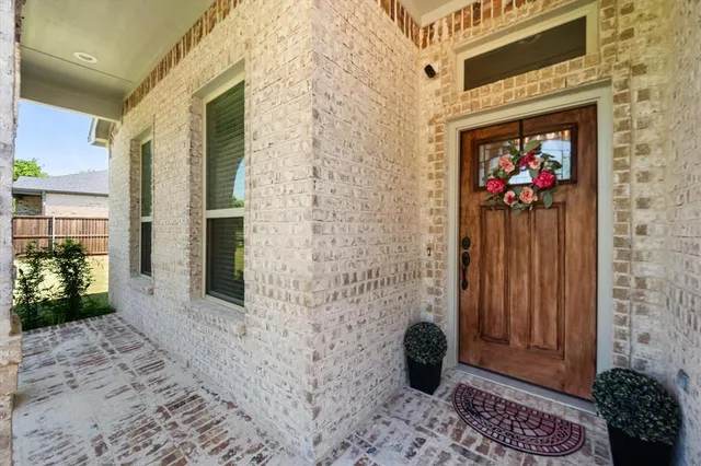 a view of a entryway door front of house