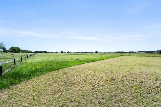 a view of a lake with a big yard