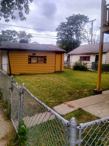 a front view of house with yard