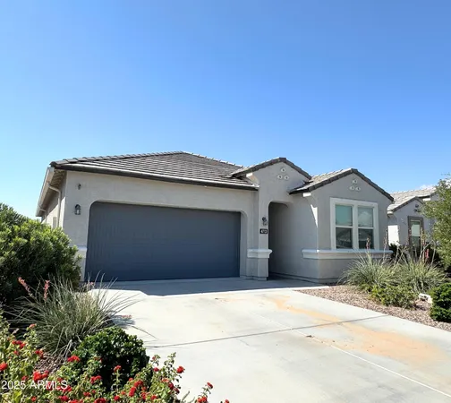 a front view of a house with a garage