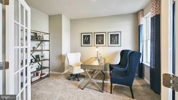 a bed room with a bed and a window