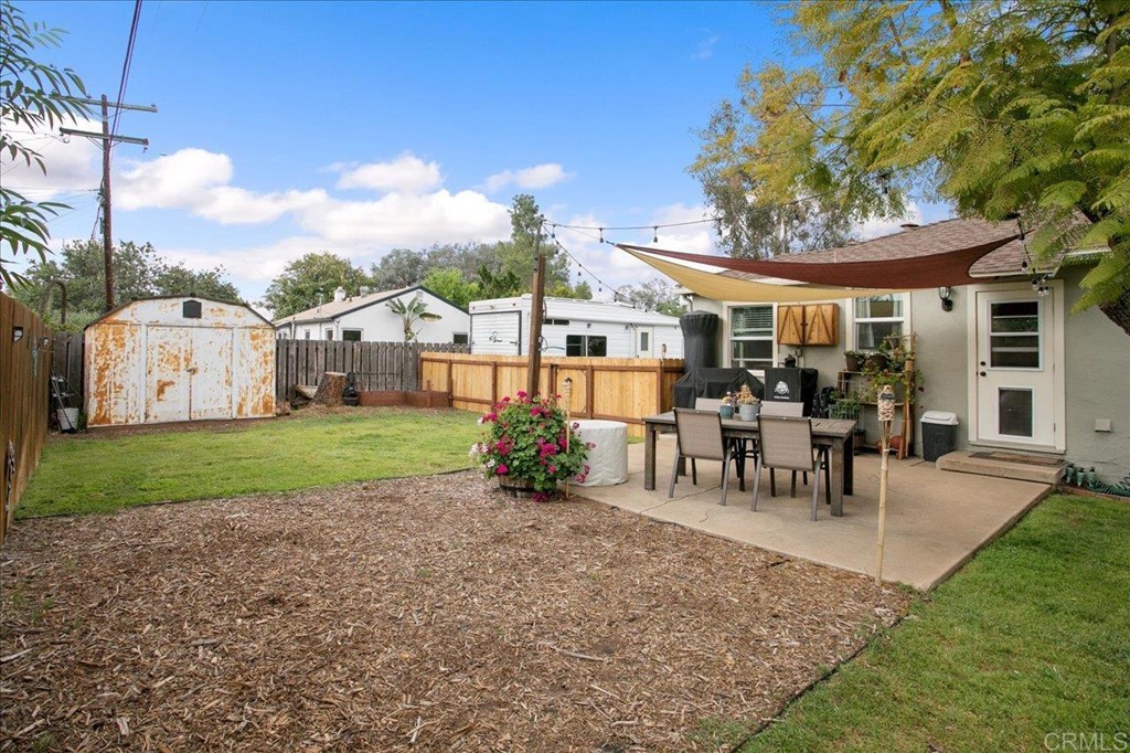 4989 Porter Hill Road La Mesa, CA 91942 - Photo 14 of 22 a view of a house with backyard porch and sitting area
