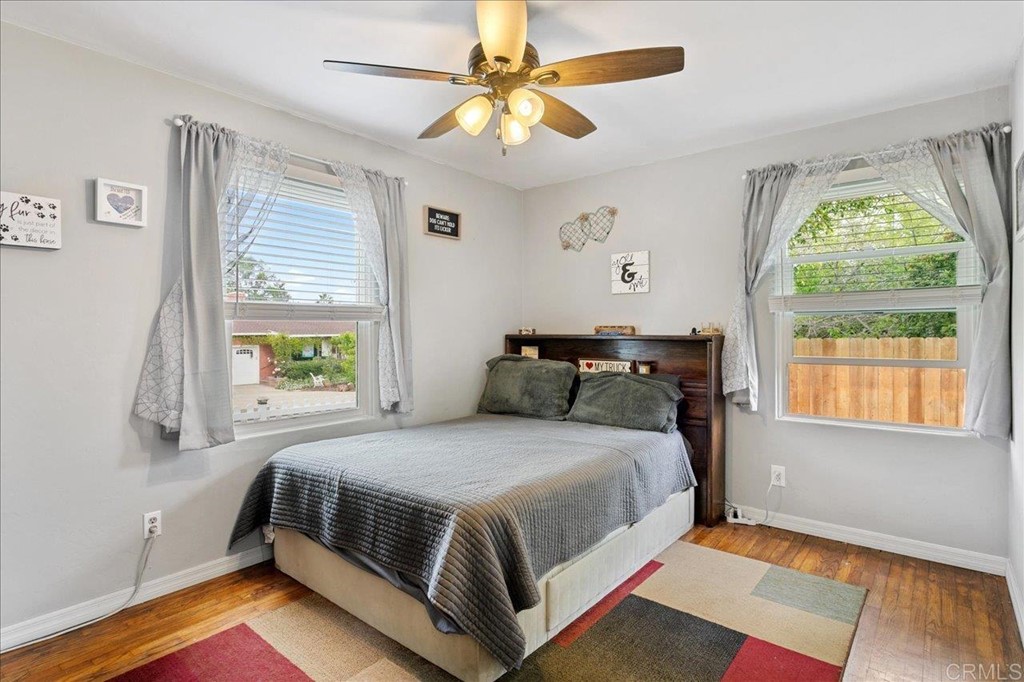 4989 Porter Hill Road La Mesa, CA 91942 - Photo 4 of 22 a bedroom with a bed and a window