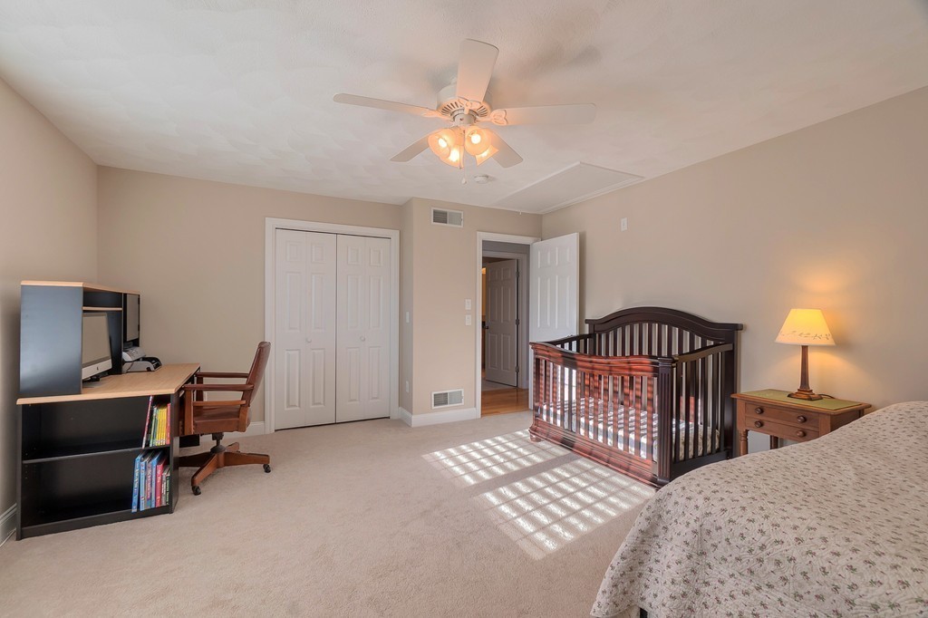8 A Turtle Hill Road, Unit 8A Ayer, MA 01432 - Photo 21 of 35 a bedroom with furniture and a window