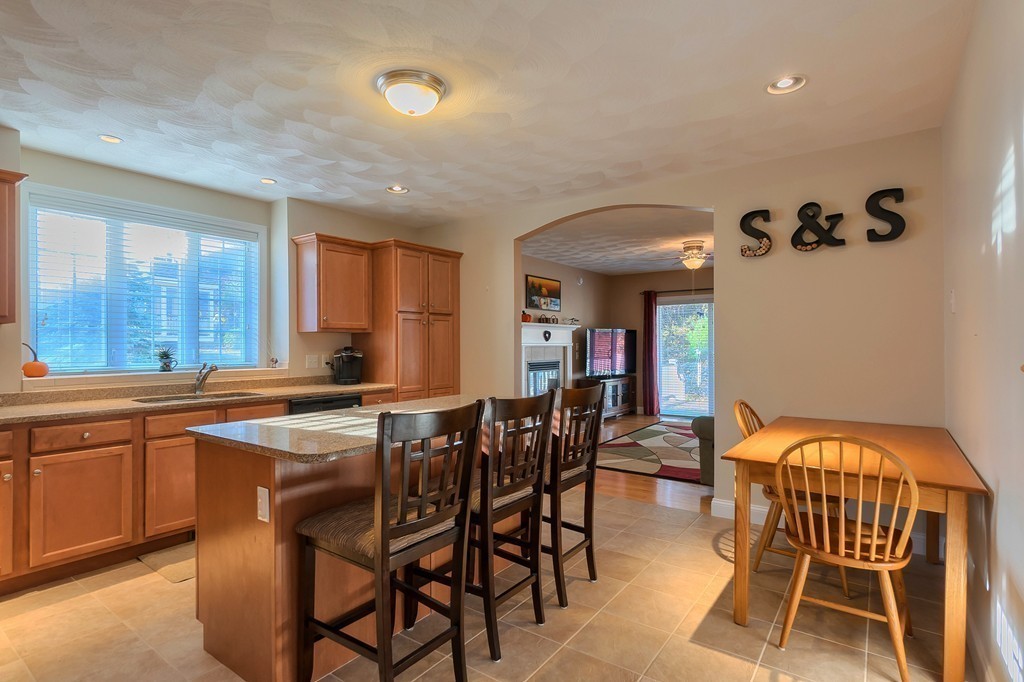 8 A Turtle Hill Road, Unit 8A Ayer, MA 01432 - Photo 6 of 35 a view of a dining room with furniture and window