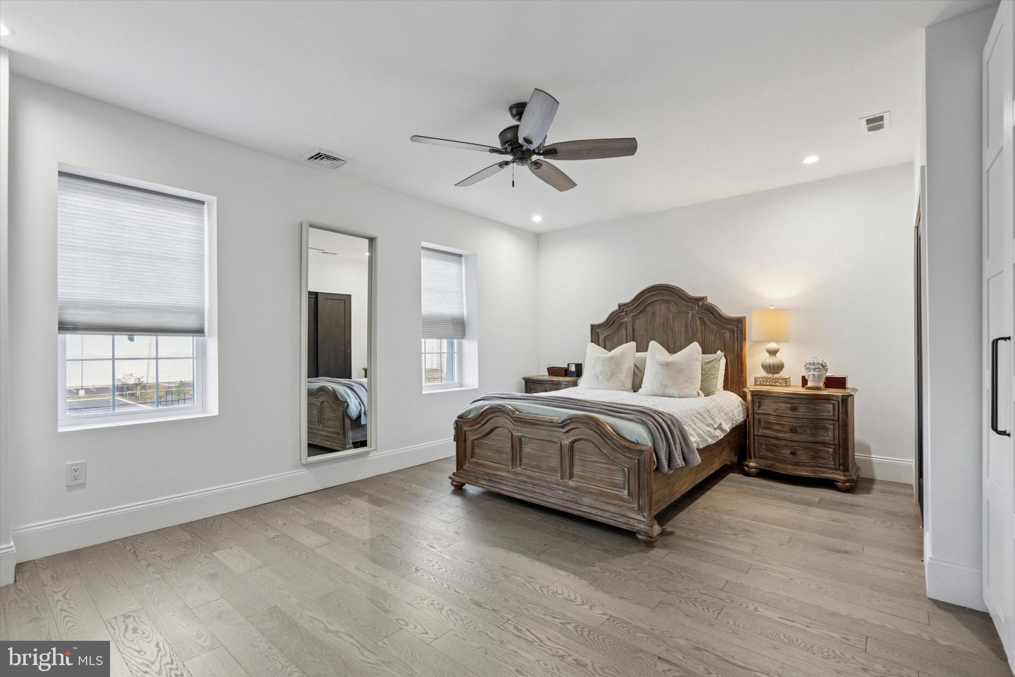 2694 Bridge Street Philadelphia, PA 19137 - Photo 18 of 41 a spacious bedroom with a bed and window