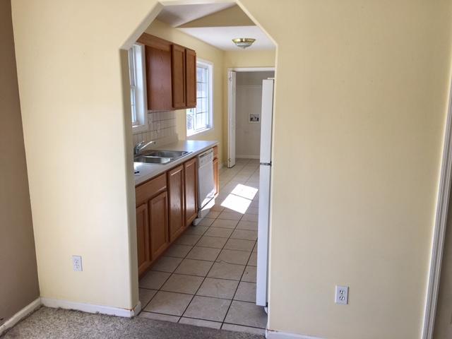 542 Coffey Road New Tazewell, TN 37825 - Photo 8 of 22 KITCHEN ARCHED DOOR