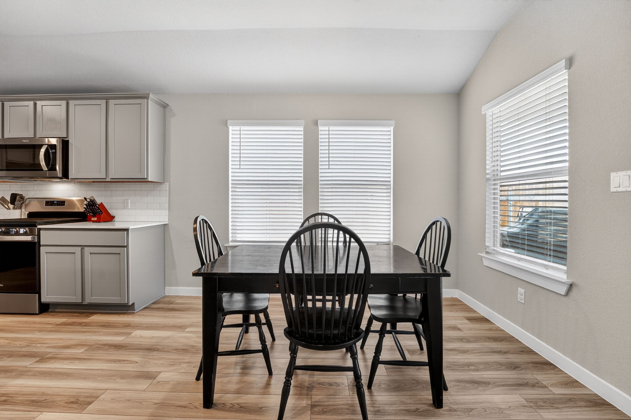 117 Halford Road Georgetown, TX 78633 - Photo 15 of 31 Dining room with light wood finished floors and vaulted ceiling