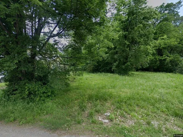 a view of an outdoor space and a yard