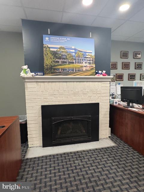 110 Valley Street Lewistown, PA 17044 - Photo 3 of 46 a living room with a fireplace and a flat screen tv