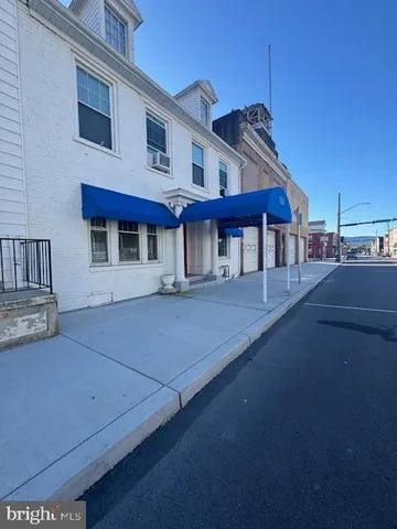 a front view of a house with windows