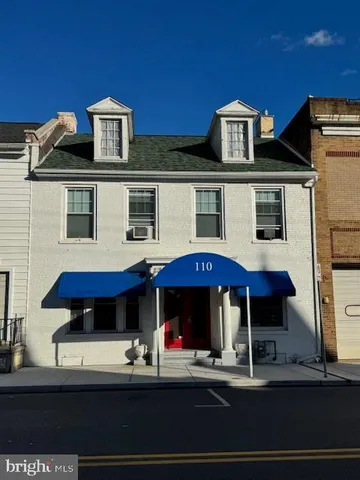 a view of building with seating space