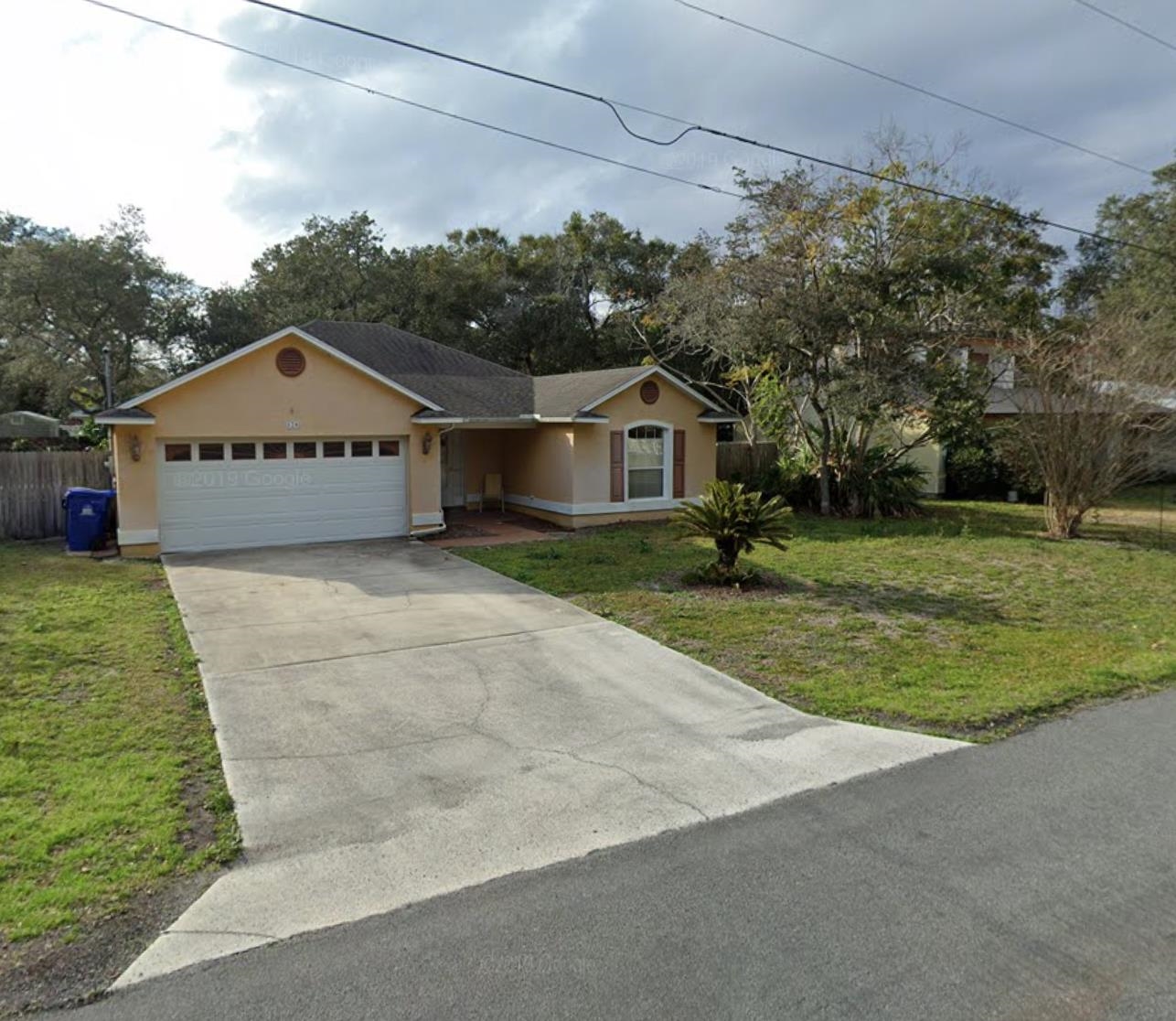 120 Shamrock Road St. Augustine, FL 32086 - Photo 1 of 1 a front view of a house with a yard