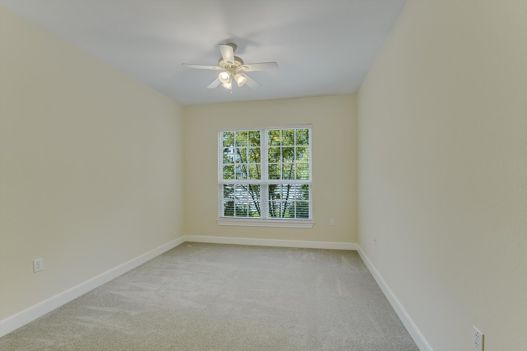 603 Rio Grande Loop Georgetown, TX 78633 - Photo 20 of 27 Unfurnished room featuring light colored carpet and a ceiling fan