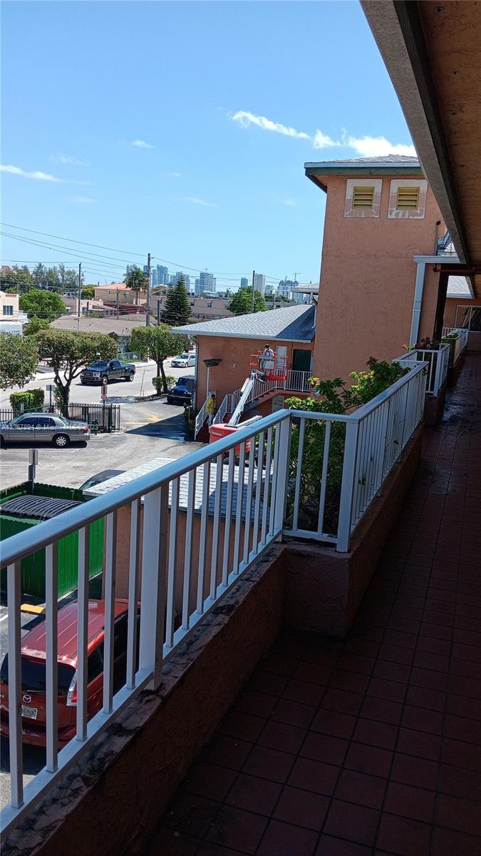 1852 Southwest 7th Street, Unit 309 Miami, FL 33135 - Photo 11 of 12 a view of a balcony with city view