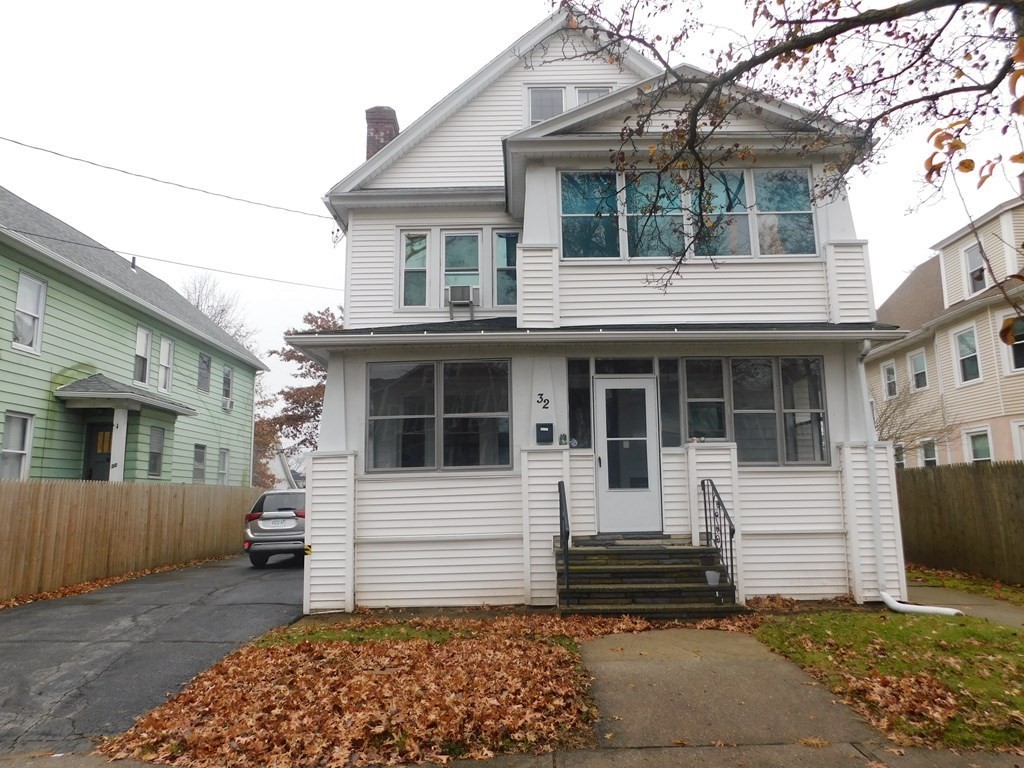32-34 Rittenhouse Terrace Springfield, MA 01108 - Photo 1 of 23 a front view of a house with a garage