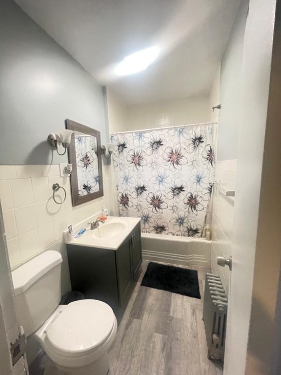 32-34 Rittenhouse Terrace Springfield, MA 01108 - Photo 6 of 23 a bathroom with a toilet sink and mirror