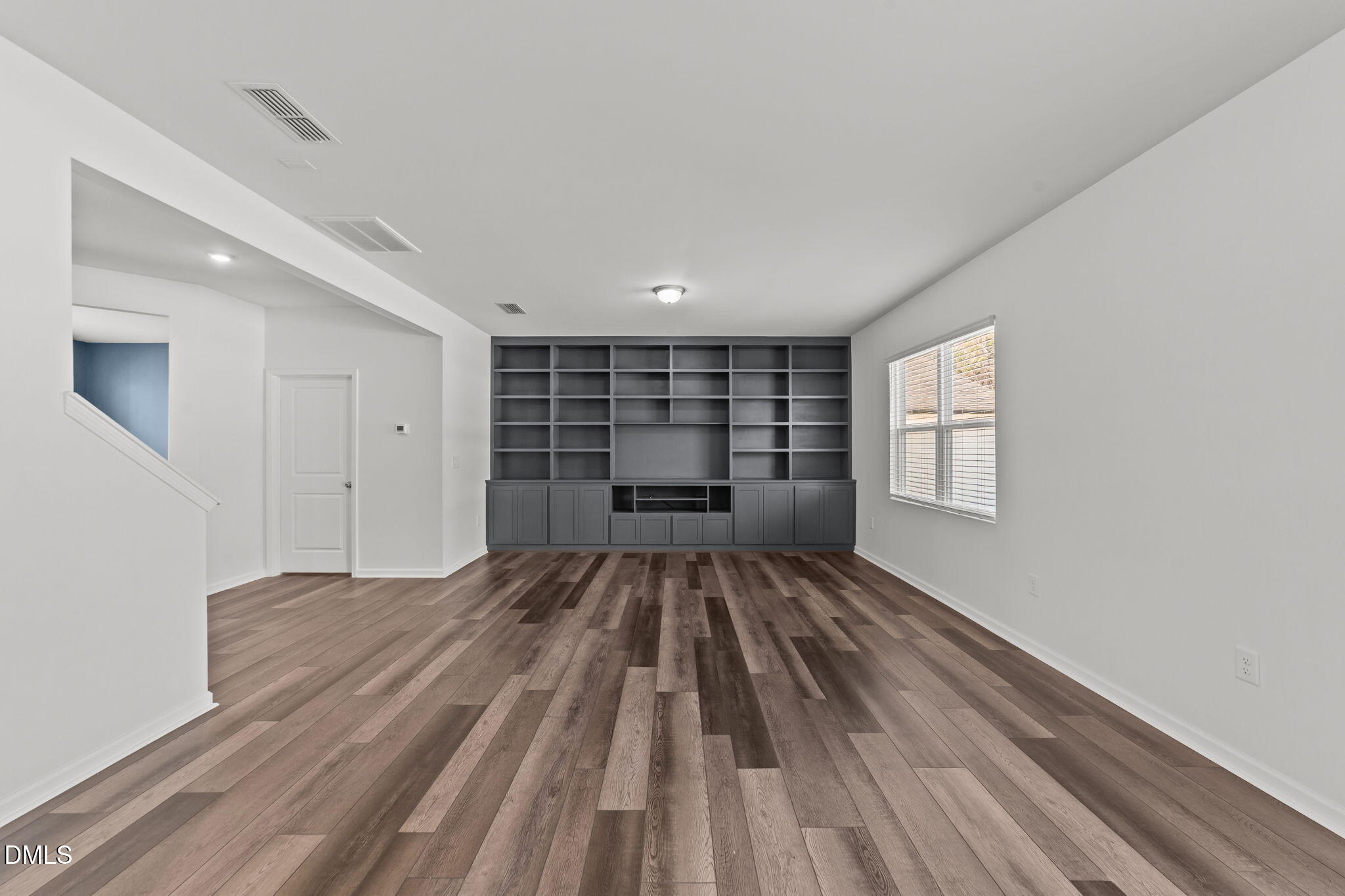 1421 Justice Union Court Raleigh, NC 27604 - Photo 6 of 21 a view of wooden floor in an empty room