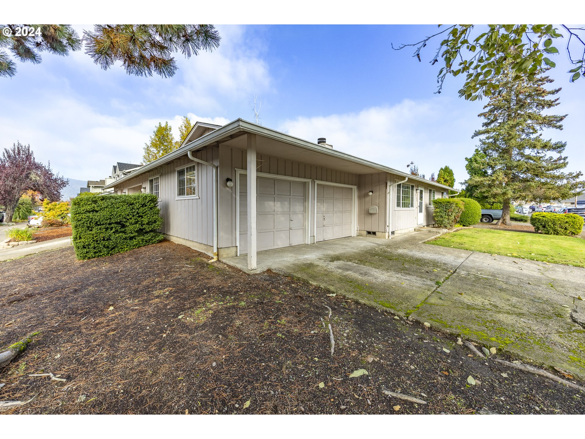 6780 D Court Springfield, OR 97478 - Photo 3 of 45 a view of a house with a yard