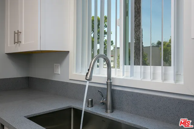 a kitchen with a stove and a microwave